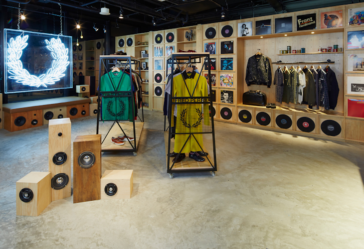 The Fred Perry Laurel Wreath Store in Singapore, designed by Studio Königshausen, pays homage to music and youth culture through its unique design. 